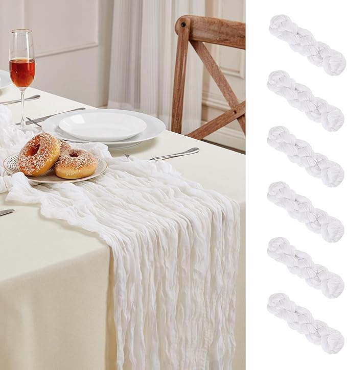 Photo 1 of 
Click to see full view
 

 

 

 

 

 
2+
 

5 VIDEOS
6 Pack White Cheesecloth Table Runner 10FT Long Boho Gauze Table Runner Rustic Sheer Runner for Wedding Bridal Baby Shower Birthday Party Table Decor Thanksgiving Christmas Decorations