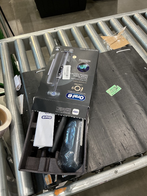 Photo 1 of **MISSING PARTS**
Oral-B iO Series 9 Limited Rechargeable Black Electric Toothbrush with (2) Ultimate Clean and (1) Gentle Care Replacement Brush Heads, Black, Travel Case and Charger