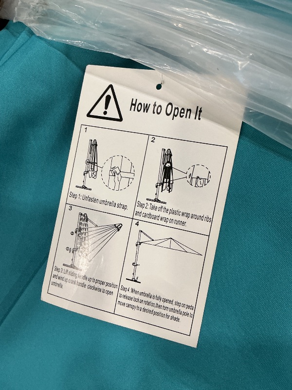 Photo 1 of **HOLE IN UMBRELLA** giant patio umbrella