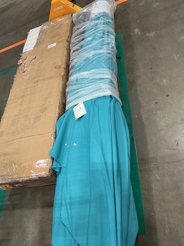 Photo 1 of **HOLE IN UMBRELLA** giant patio umbrella