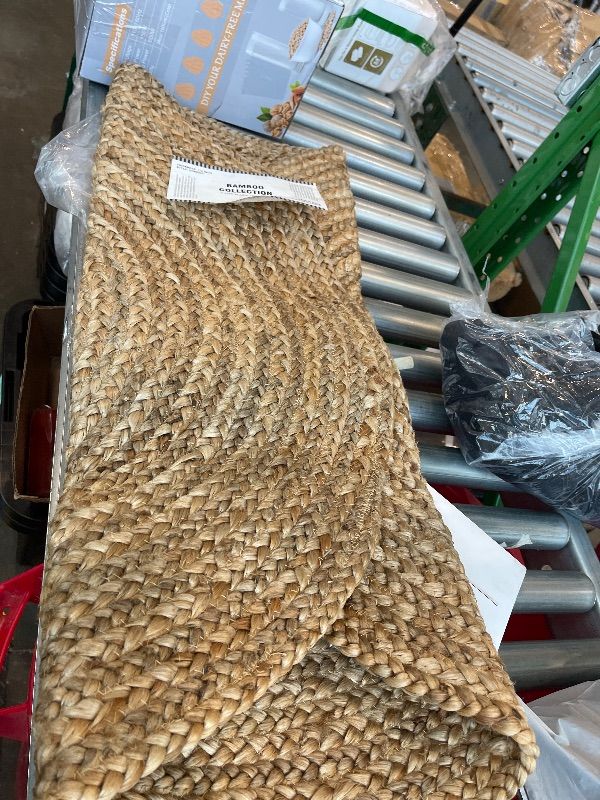 Photo 1 of *bamboo round rug/look at pic*