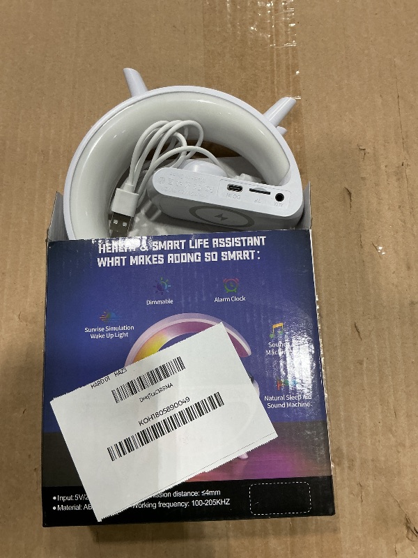 Photo 1 of XCDIFA Mini LED Table Lamp with 4-in-1 Wireless Charger, Night Light, Sunrise Alarm Clock, Bluetooth Speaker, Smart Atmosphere Table Lamp for Bedroom, Office, Home Decor (White)