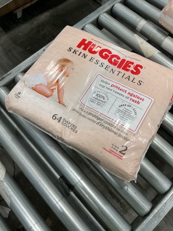 Photo 1 of *** SEE CLERK COMMENTS*** Huggies Size Newborn Diapers, Skin Essentials Baby Diapers, Size Newborn (6-9 lbs) 64 count