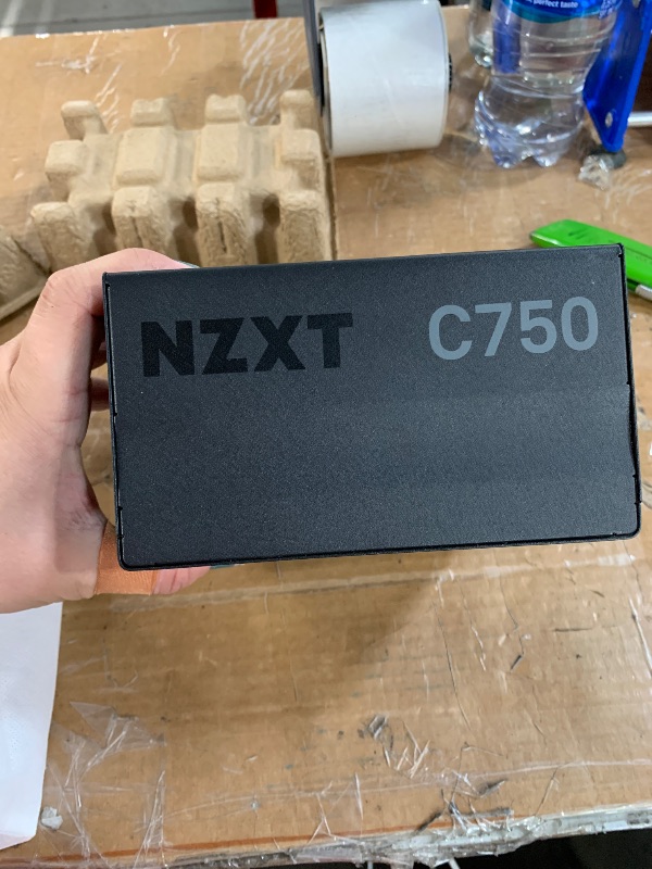 View 7 of *** Missing 2 cables and someone swapped out the C850 and put in a C750*** PARTS ONLY***
NZXT C750 Gold Core - 850W ATX 3.1 Power Supply - 80 Plus Gold - Cybenetics Platinum - Fully Modular - PCIe 5.1 600W 12V-2x6 - Zero RPM Fan - 105°C Capacitors - Black