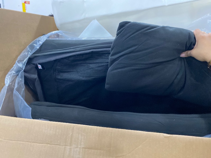 Photo 1 of **MISSING PIECES** Black foldable bed