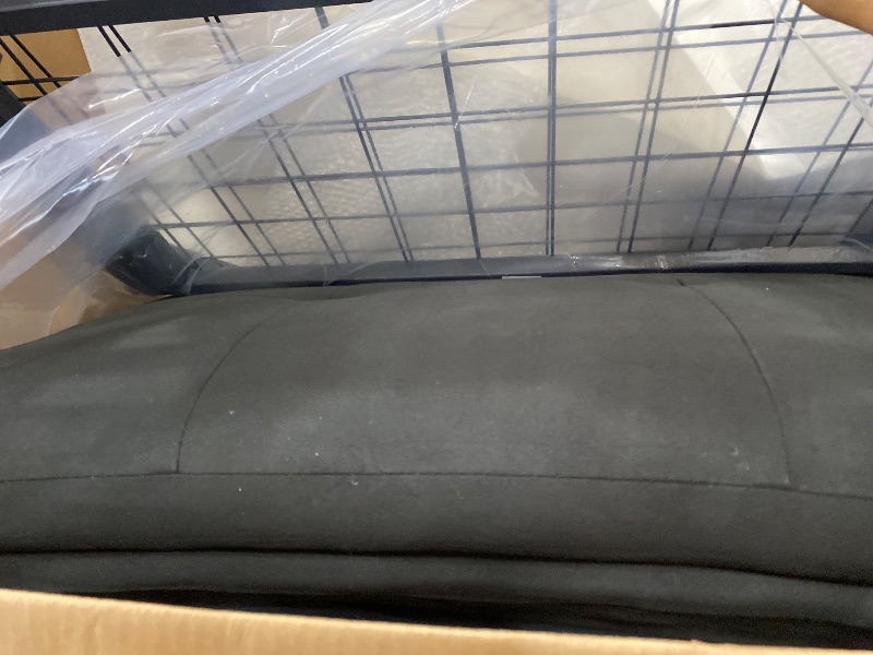 Photo 1 of **MISSING PIECES** Black foldable bed