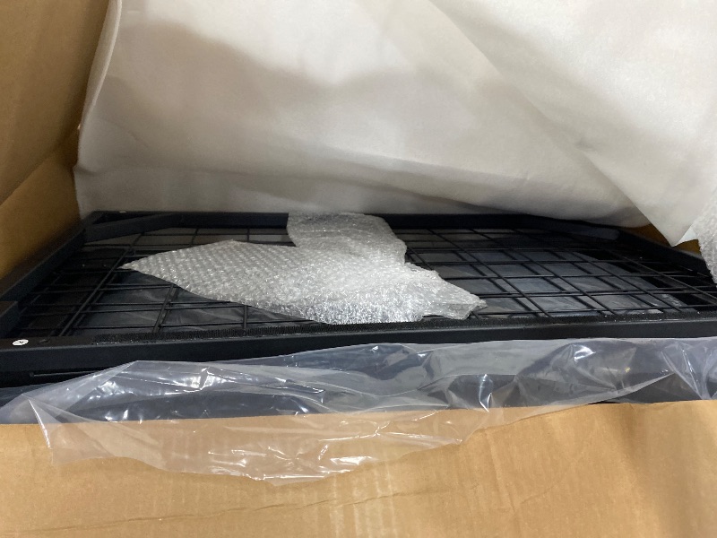 Photo 1 of **MISSING PIECES** Black foldable bed