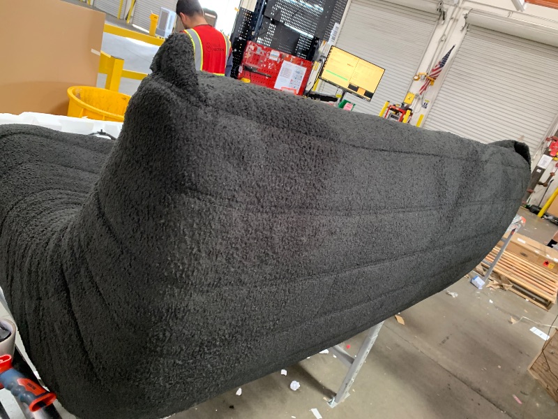 Photo 1 of *** DAMAGE SHOWN IN PHOTO ***Large black lounge chair