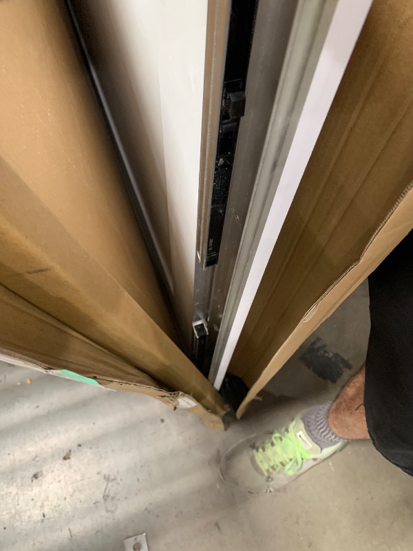 Photo 1 of **Missing hardware***BarnSmith 36"x84" Concealed Sliding Barn Door, Shaker Style Flat 1 Panel White Primed Solid Core Hidden Barn Door with Soft Close Installation Hardware and Handles Included, Pre-Assembled Panel