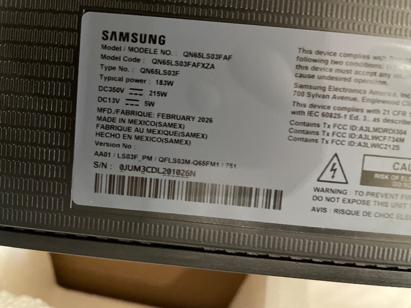 Photo 1 of **DAMAGED** Samsung 65-Inch Class The Frame LS03F 4K QLED Smart TV (2025 Model) Slim Fit Wall Mount, Modern Frame Design, NQ4 AI Gen2 Processor, Art Mode, Artful Picture Quality, Samsung Vision AI, Alexa Built-in