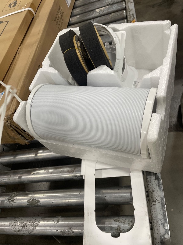 Photo 1 of **HAS PROBLEMS RUNNING PROPERLY, THE MOTOR MAY BE DAMAGED** Midea 10,000 BTU ASHRAE (7,100 BTU SACC) Portable Air Conditioner, Smart Control, Cools up to 300 Sq. Ft., with Dehumidifier & Fan mode, Easy- to-use Remote Control & Window Installation Kit Incl