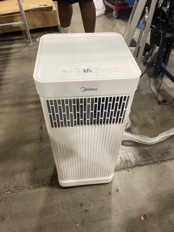 Photo 1 of **HAS PROBLEMS RUNNING PROPERLY, THE MOTOR MAY BE DAMAGED** Midea 10,000 BTU ASHRAE (7,100 BTU SACC) Portable Air Conditioner, Smart Control, Cools up to 300 Sq. Ft., with Dehumidifier & Fan mode, Easy- to-use Remote Control & Window Installation Kit Incl