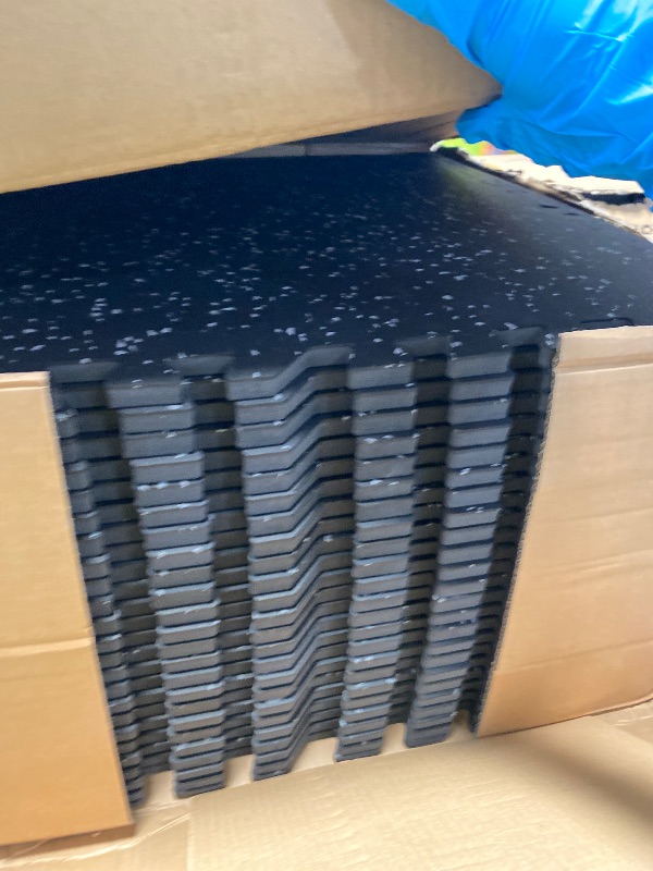 Photo 1 of 0.56-Inch Thick 96 Sq ft Exercise Equipment Mats | 24 Tiles Interlocking High-Density EVA Foam Rubber Puzzle Gym Flooring for Home Gym & Heavy Weight Workouts, 24 x 24 in Black/Gray