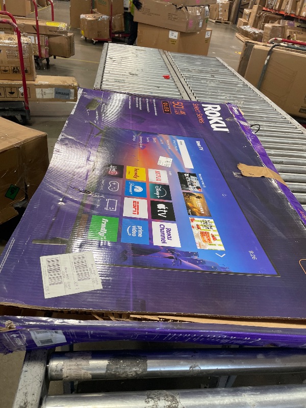 Photo 1 of **DAMAGED** Roku Smart TV 2026 – 50-Inch Select Series, 4K QLED TV – Roku TV with Voice Remote – Flat Screen QLED Television with Wi-Fi for Streaming Live Local News, Sports, & Movies – Bluetooth Headphone Mode