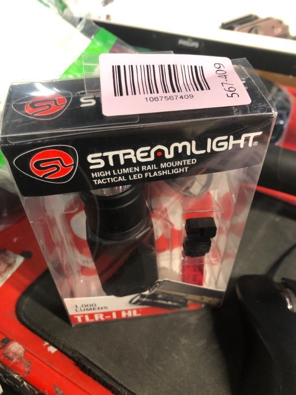 Photo 1 of ***FACTORY SEALED*** Streamlight 69264 TLR-1 HL 1000-Lumen 20000 Candela Rail-Mounted Tactical Weapon Light with Earless Screw and Specific Compatibility Rail Locating Keys, Black