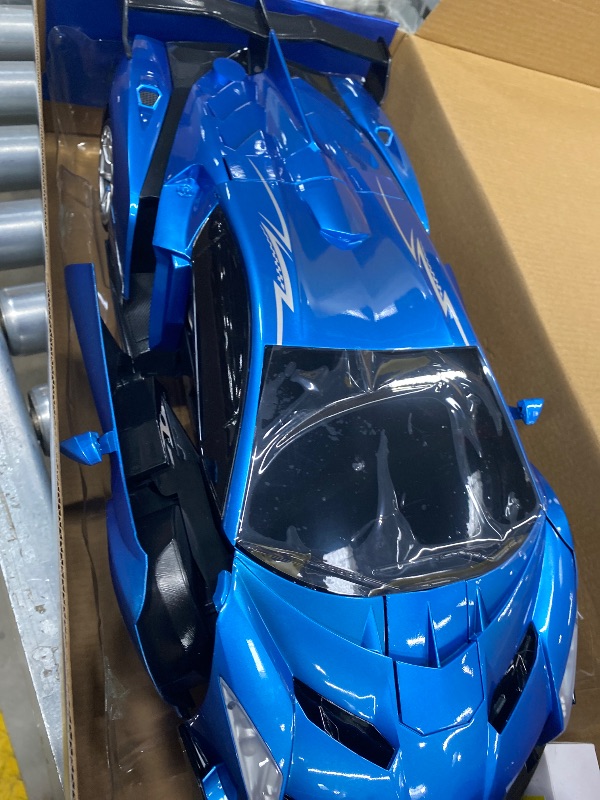 Photo 1 of ***DAMAGED -SELLING AS IS *** Veeniix V991 Transform Remote Control Car, 1:10 Big Size, 2 Rechargeable Batteries for 70Min, 2.4GHz Gesture Sensing, One-Key Deformation, Robot Toys Gifts for Boys and Girls (Blue)