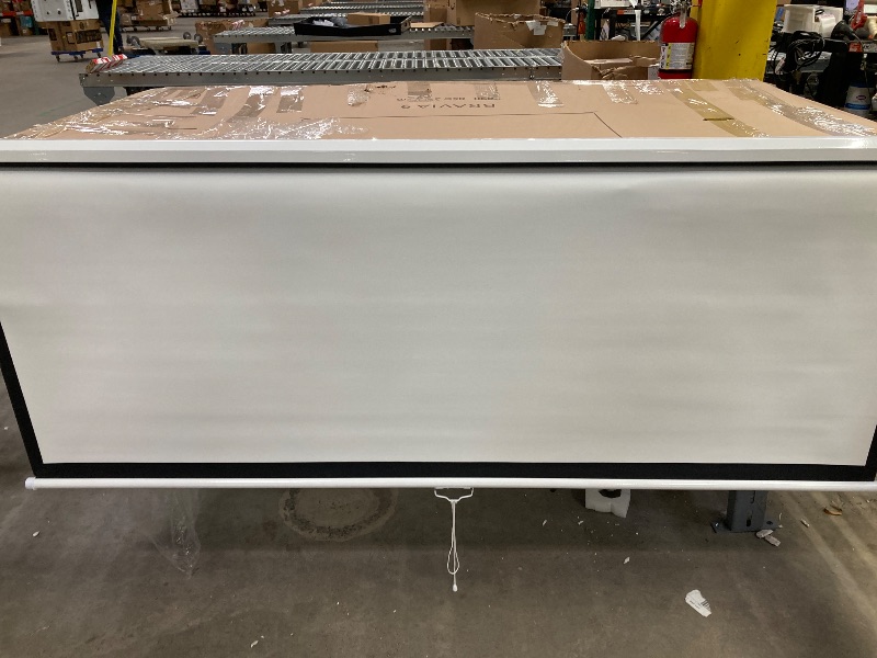 Photo 1 of ***DAMAGE -DENT ON FRAME -SELLING AS IS*** 
Pyle Manual Pull-Down Projector Screen - Universal 84-inch Roll-Down Retractable Manual Projection Screen w/ Auto-Locking, Adjustable Screen Height, Black Masking Border - 50.3” x 67.3” PRJSM9406