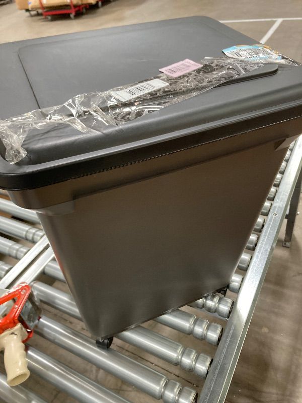 Photo 1 of ***DAMAGE -ONE WHEEL BROKEN -SELLING AS IS *** IRIS USA Dog Food Storage Container 58 lbs, Attachable Wheels, for Dog Cat Birds and other Pets, Food Storage Bin, Keep Fresh, Easy Mobility, BPA Free - Made in the USA, Black ***SOME SCUFFS/SCRATCHES, NOT I