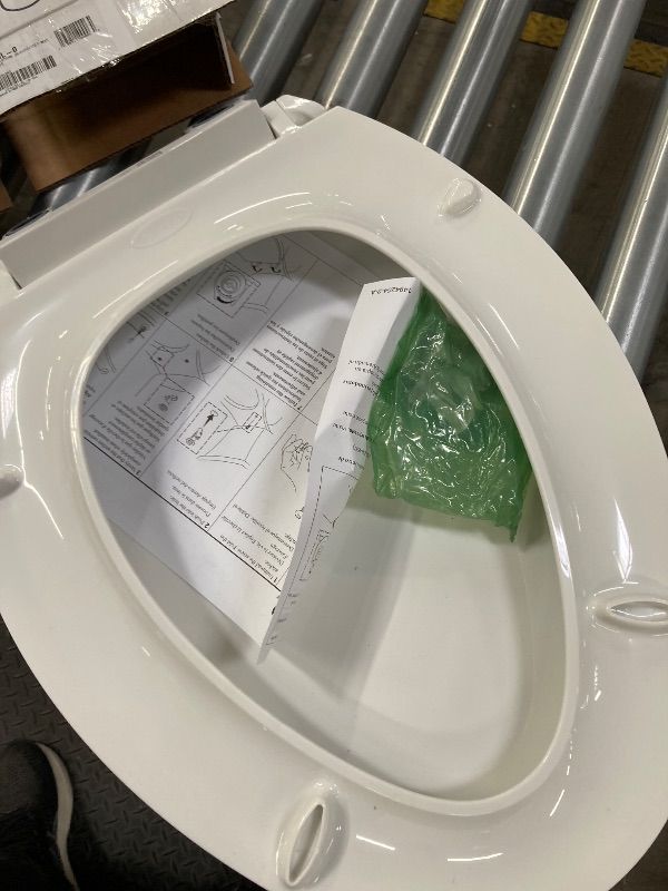 Photo 1 of ***MISSING PARTS -SELLING AS IS *** PLASTIC NOT WOOD

KOHLER 4636-RL-0 Cachet ReadyLatch Elongated Toilet Seat Slow Close, Soft Close Toilet Seat Quiet Lid, Contoured Grip-Tight Bumpers Installation Hardware, Apartment Essentials, White