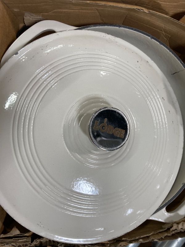 Photo 1 of **PAN HAS CRACK ON SIDE**Lodge 3.6 Quart Enameled Cast Iron Round Casserole With Lid– Dual Handles – Oven Safe up to 500° F or on Stovetop - Use to Marinate, Cook, Bake, Refrigerate and Serve – Oyster White