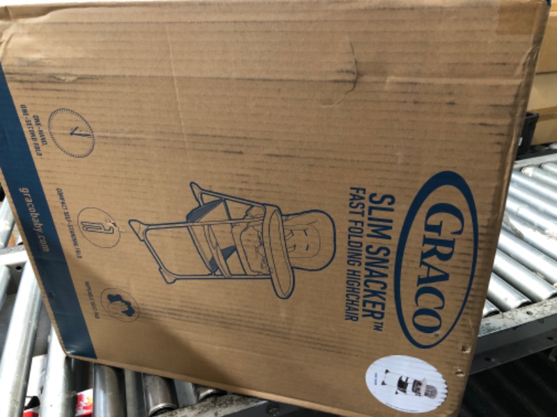 Photo 1 of ***FACTORY SEALED***  Graco Slim Snacker High Chair, Ultra Slim, Fast-Folding, Multiple Recline Positions, Comfortable Feeding, Whisk