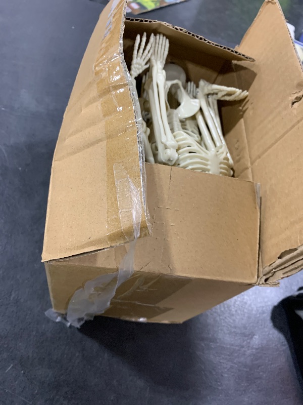 Photo 1 of 10 PCS Halloween Skeleton 16 Inches, Full Body Posable Hanging Skeleton with Movable Joints for Halloween Party Decor Indoor and Outdoor Spooky Scary Yard Lawn Garden Patio Haunted House