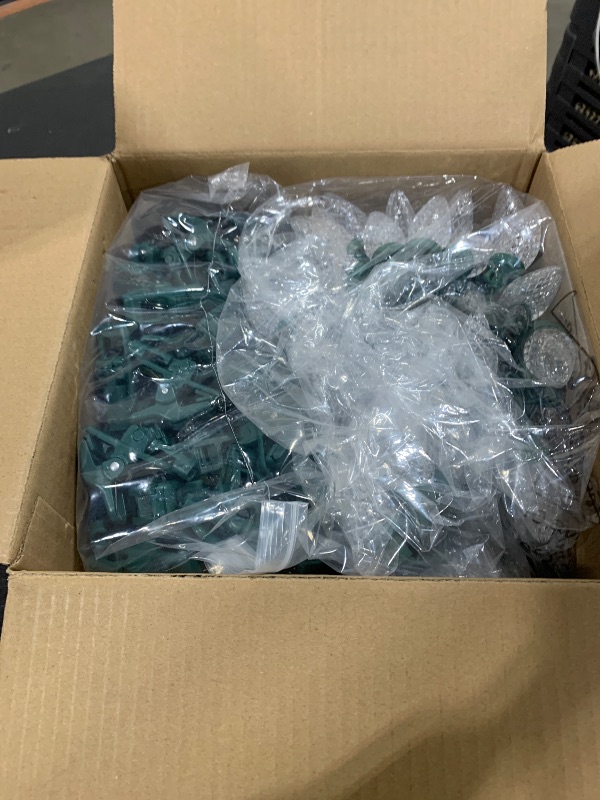 Photo 1 of C9 68Ft Led Christmas String Lights 100 LED with Quick Clips Outdoor Waterproof Strawberry Lights, Commercial Grade Extendable for Indoor Outside Roofline Patio Home Xmas Decoration, Warm White