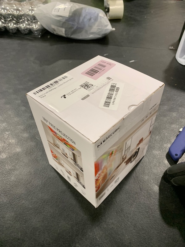 Photo 1 of ?Auto Focus&1080P?Magcubic Mini Smart Projector with 4K Support, Portable Projector with Wifi and Bluetooth, 5W Speaker, Built in Apps, Voice Control, Outdoor Movie Projector