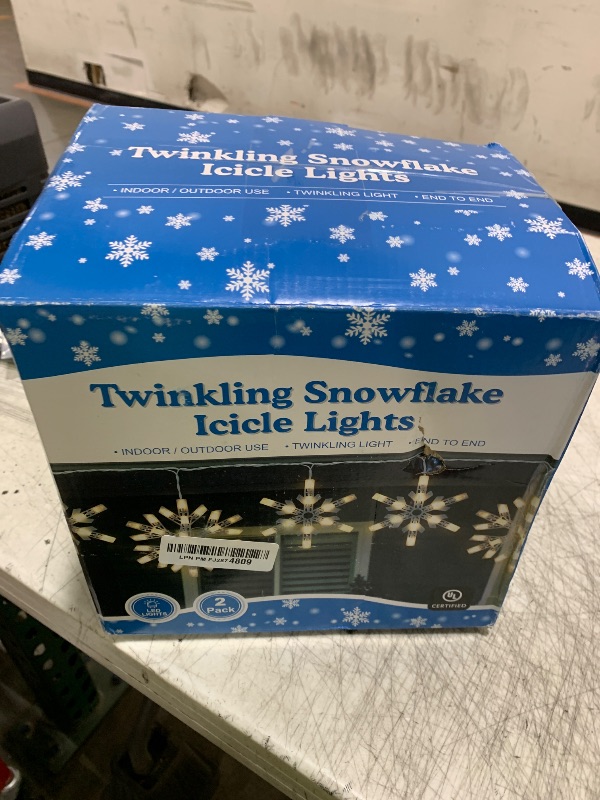 Photo 1 of 2 Pack Twinkling LED Christmas Snowflake Lights with 6 Drops, 8.8FT 14 of 100 Random Twinkle Christmas Snowflake String Lights, Connectable Hanging Plug in Icicle Light for House Roof (Warm White)