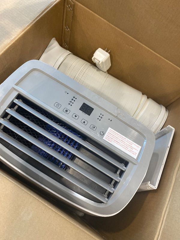 Photo 1 of ** for part **BLACK+DECKER Portable Air Conditioner, 10,000 BTU (6,300 BTU SACC) for Rooms up to 450 Sq. Ft., Portable AC with Follow Me Remote Control and Window Kit, BPACT10WT, White