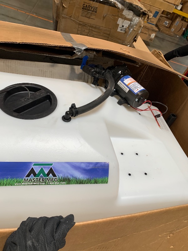 Photo 1 of ** VERY USED** Master Mfg 36-Gallon Premium Pull-Behind Trailer Broadcast Sprayer - 10ft Swath, 3.0GPM, 60PSI Max
