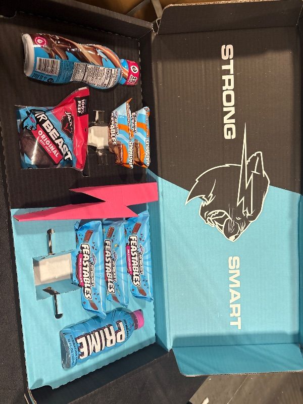 Photo 1 of **MISSING ONE CARAMEL CHOCOLATE BAR AND PEANUT BUTTER CUP PACK**
jack Link’s x MrBeast Beef Jerky Variety Box, As Seen on Beast Games, Made with 100% Real Beef, Jerky Bags, Beef Sticks, Pantry-Ready Snacks, 9 Count Variety Pack