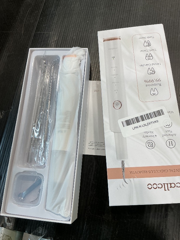 Photo 1 of **NEEDS CHARGER**Plaque Remover for Teeth, Electric Tooth Cleaner Tartar Remover for Teeth with LED Light,4 Modes Rechargeable Teeth Cleaning Kit with Dental Tools, 2 Replaceable Heads (White A)