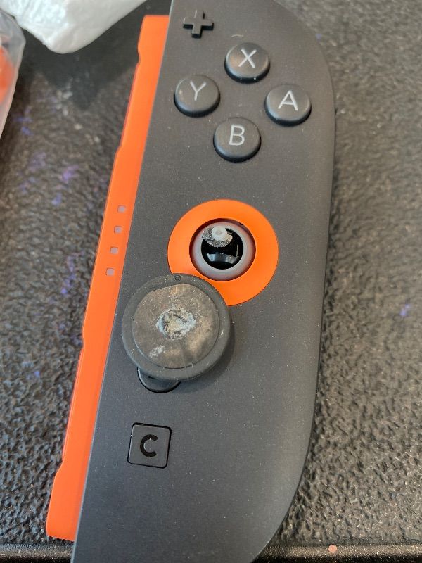 Photo 1 of ***MAJOR DAMAGE*** Nintendo Joy-Con™ 2 (R) Light Red