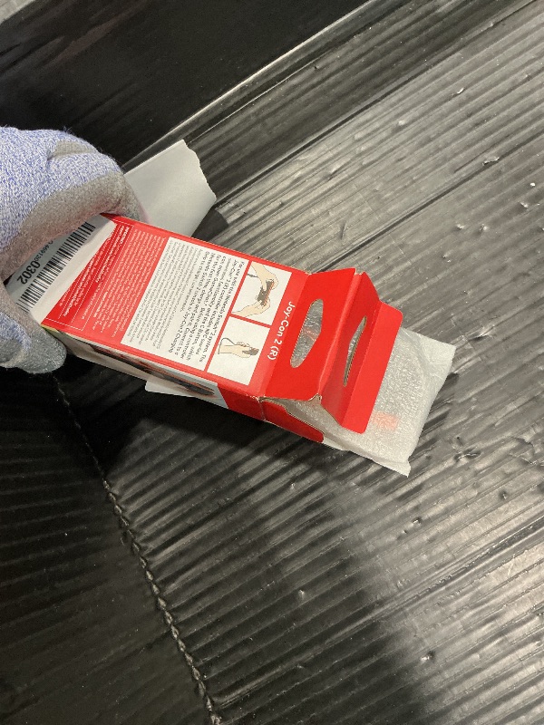 Photo 1 of ***MAJOR DAMAGE*** Nintendo Joy-Con™ 2 (R) Light Red