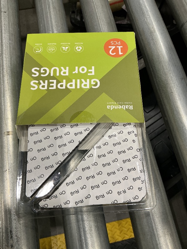 Photo 1 of **MISSING PIECES** 
 12 Pcs Rug Tape, Non Slip Rug Pads Grippers for Hardwood Floors and Tiles, Reusable Carpet Tape for Area Rugs, Double-Sided Adhesive Rug Stickers Keep Corners Flat (Black)