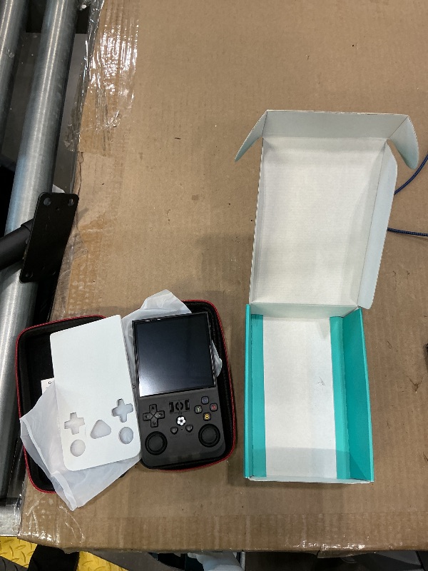 Photo 1 of ?R36MAX 4000mAh Portable Rechargeable Handheld Retro Game Console,Comfort Non-Slip Handheld Standing Retro Game Console with 64G TF Car,4.0-inch Screen,for Office,Black
