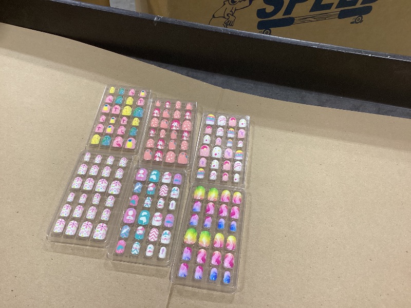 Photo 1 of 144 Pieces Press on Nails Grils, Thrilez Children Fake Artificial False Nail Tips Pre Glue Full Cover Short Acrylic Nails for Girls Kids Nail Art Decoration (Rainbow Sky)