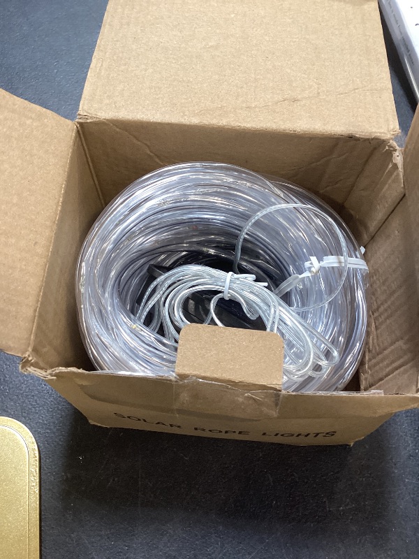 Photo 1 of YEGUO Solar Christmas Light Outdoor Waterproof, 66ft 200 LED Multicolor Rope Lights, 8 Modes Tube String Lights in Clear Thin Tube