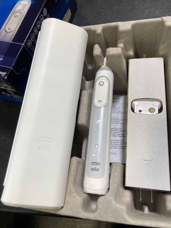 Photo 1 of Oral-B Genius X Limited Rechargeable Electric Toothbrush with 1 Replacement Brush Head, Travel Case, White