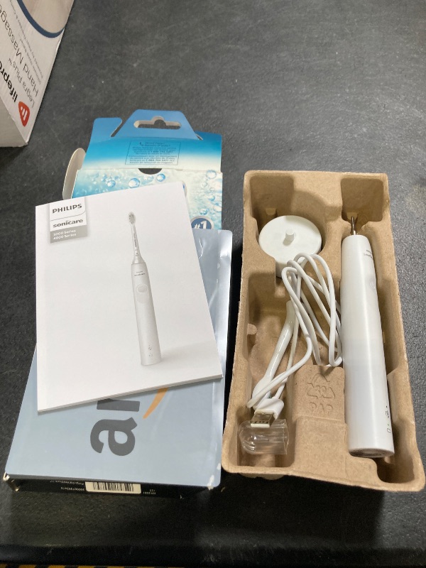 Photo 1 of Philips Sonicare 4100 Series Electric Toothbrush - Sonic Toothbrush with Advanced Sonic Technology, Pressure Sensor, Two Intensity Settings, Smartimer & Quadpacer, White, Model HX3681/23