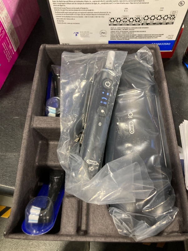 Photo 1 of Oral-B iO Deep Clean + Protect Rechargeable Electric Toothbrush, Black, iO Series 7, 2 Replacement Brush Heads, Charging Travel Case