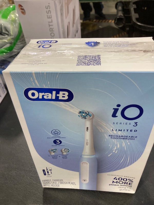 Photo 1 of Oral-B iO Deep Clean Rechargeable Electric Powered Toothbrush, Icy Blue with iO Series 3 Limited, 2 Brush Heads and Travel Case - Pressure Sensor to Protect Gums - 3 Cleaning Settings - 2 Minute Timer