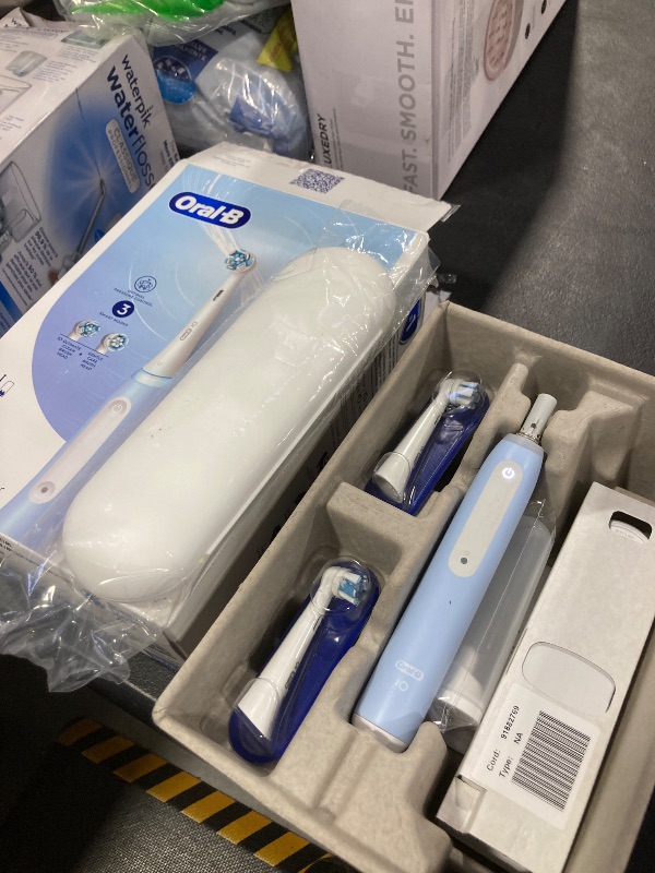 Photo 1 of Oral-B iO Deep Clean Rechargeable Electric Powered Toothbrush, Icy Blue with iO Series 3 Limited, 2 Brush Heads and Travel Case - Pressure Sensor to Protect Gums - 3 Cleaning Settings - 2 Minute Timer