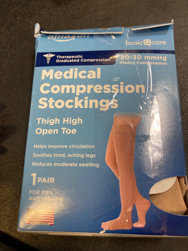 Photo 1 of Amazon Basic Care Medical Compression Stockings for Circulation, Varicose Veins, Edema, Swelling, 20-30 mmHg Graduated Compression, Women & Men Thigh Length Hose, Open Toe, Beige, X-Large (Previously NuVein)