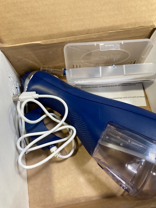 Photo 1 of Waterpik Cordless Advanced 2.0 Water Flosser For Teeth, Gums, Braces, Dental Care With Travel Bag and 4 Tips, ADA Accepted, Rechargeable, Portable, and Waterproof, Blue WP-583, Packaging May Vary