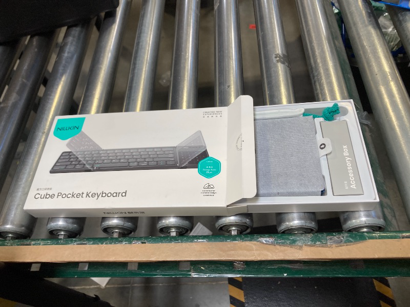 Photo 1 of Nillkin Upgraded Foldable Bluetooth Keyboard with Touchpad & Number Pad, Portable Wireless Keyboard for Travel, Pocket-Sized, Full Size Keys, Support 3 Devices for iPad Laptop Tablets Phone, Blue