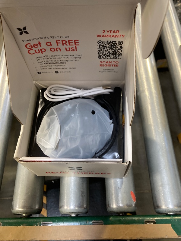 Photo 1 of REVO The Original 4-in-1 Smart Cupping Therapy Massager, Red Light Therapy for Targeted Pain Relief, Knots, Aches, Muscle Soreness, Circulation & Tighter Skin, Portable Cupping Kit