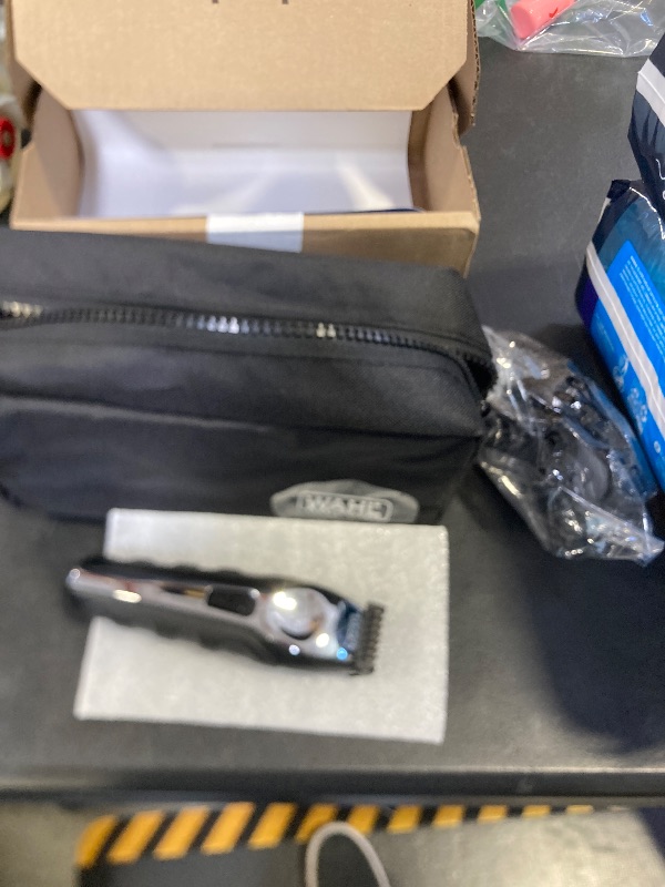 Photo 1 of Wahl USA Lithium Ion Total Beard Trimmer for Men with 11 Guide Combs for Easy Trimming, Detailing, & Grooming – Model 9888