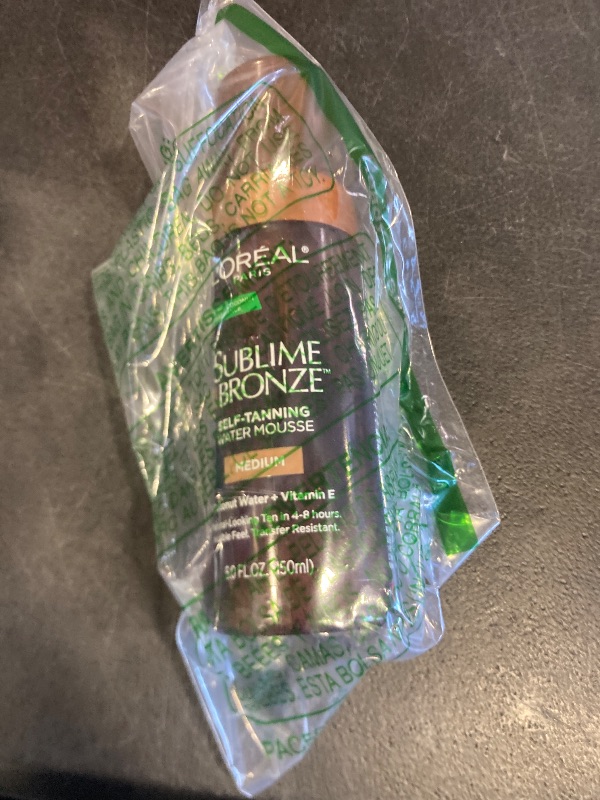 Photo 1 of lightly used L'Oreal Paris Sublime Bronze Self Tanning Water Mousse, Streak-Free Natural Looking Tan, 5 fl. Oz